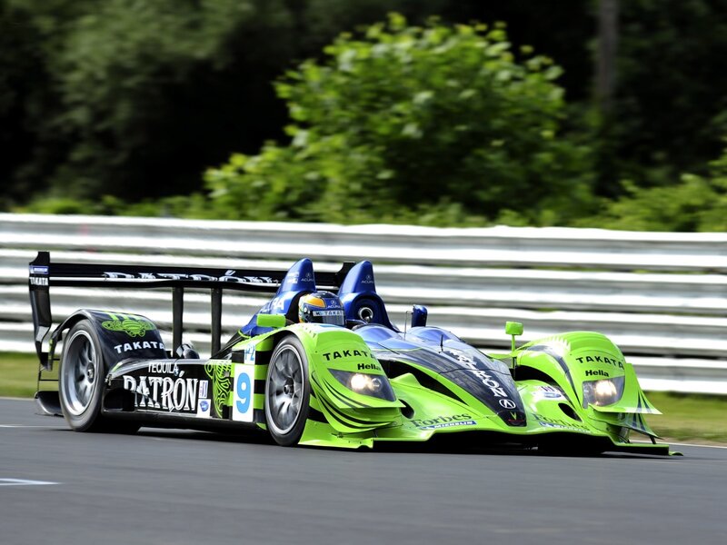 Green Race Car on Track — Dynamic, Afternoon, Photograph, Driver