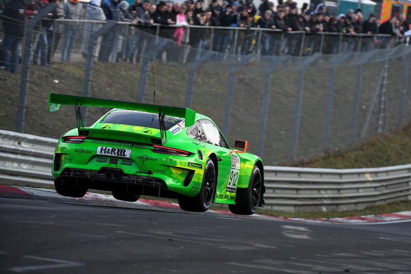 Green Race Car on Track — Dynamic, Afternoon, Photograph, Race Car, Crowd