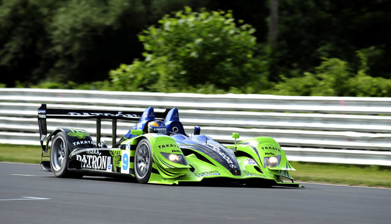 Green Race Car on Track — Dynamic, Afternoon, Photograph