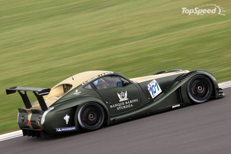 Green Race Car on Track — Dynamic, Afternoon