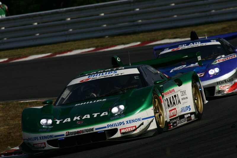 Green Race Car on Track — Dynamic, Night