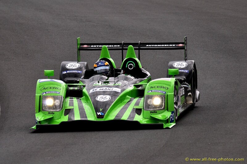 Green Race Car on Track — Dynamic, Photograph, Driver