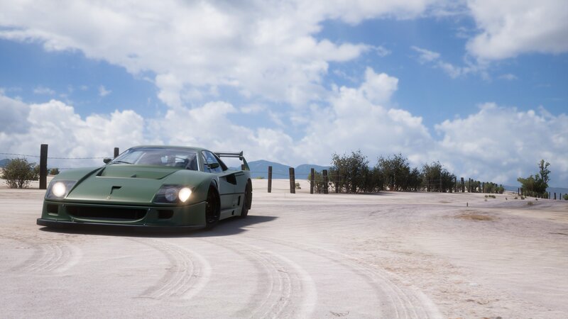 Green Race Car on Track — Open, Bright