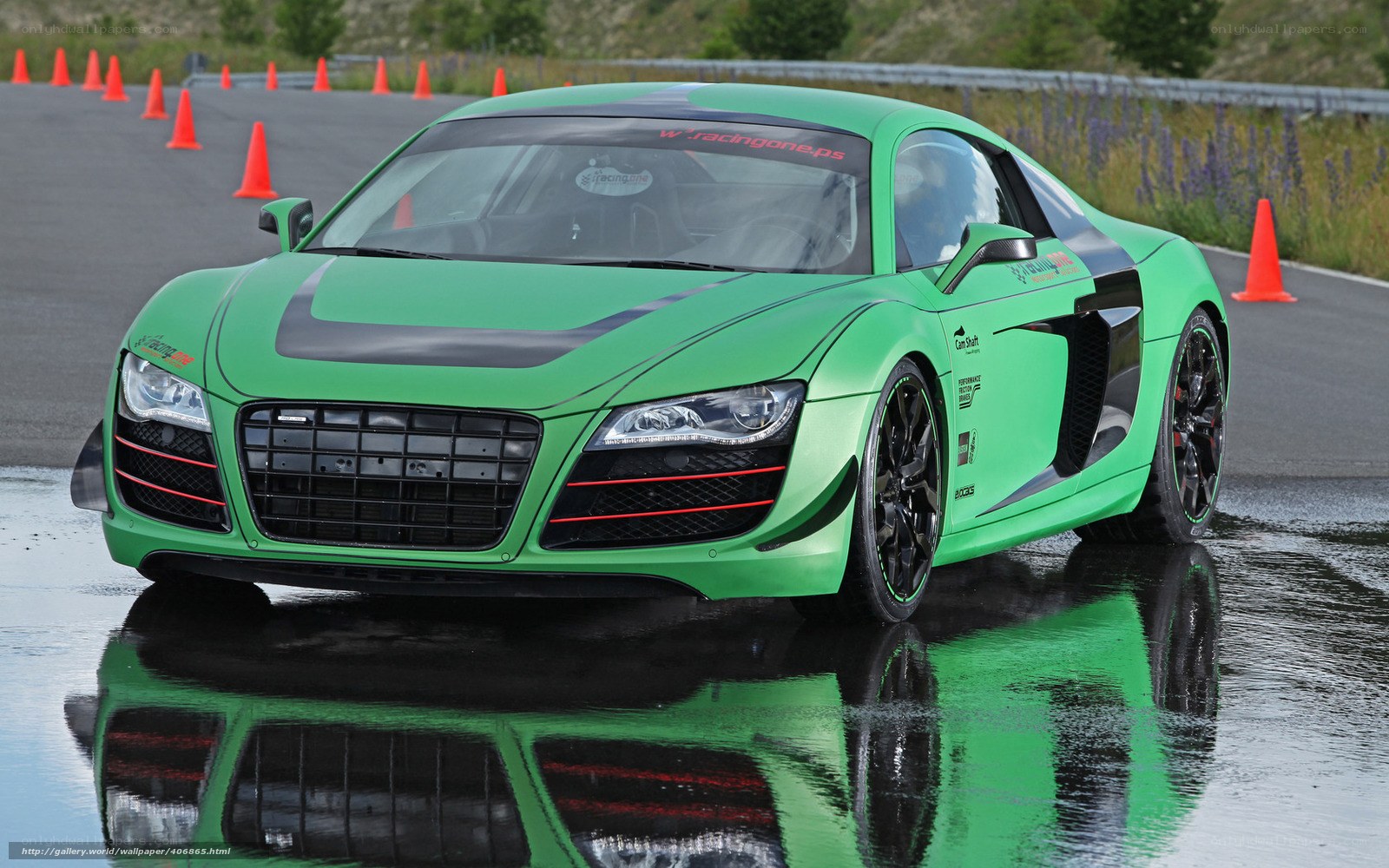 green race car on wet track