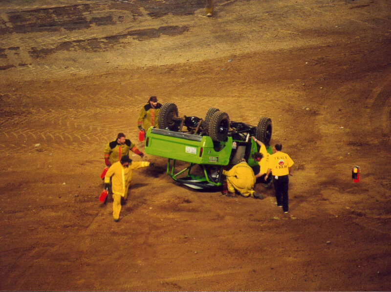 Green Race Car Overturned