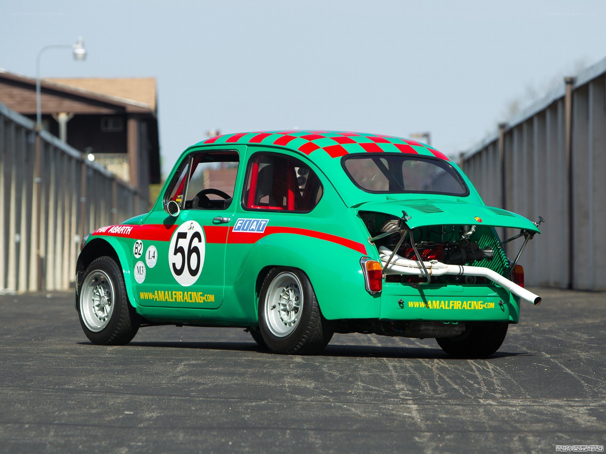 Green race car with checkered roof