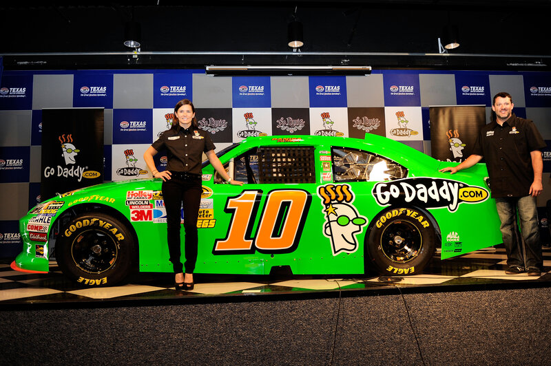 Green Race Car with People