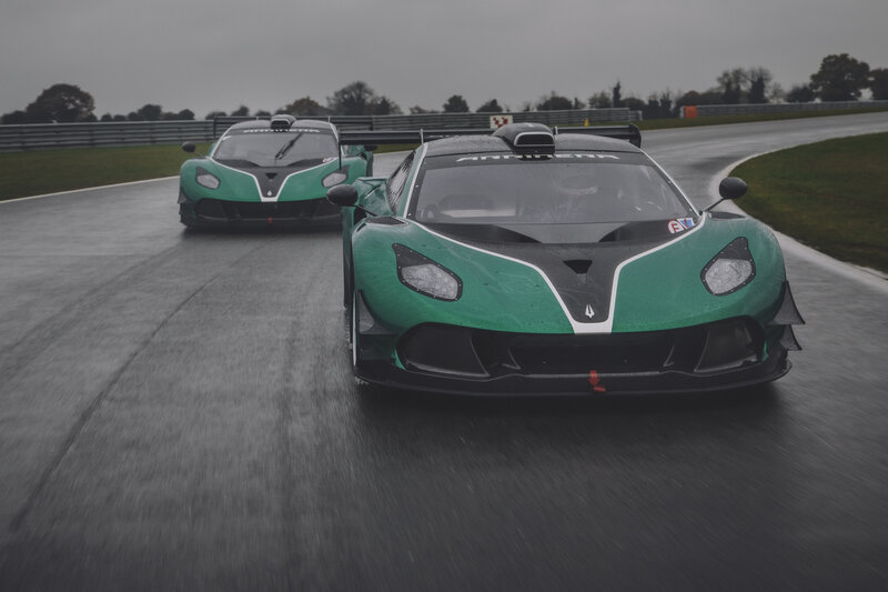 Green Race Cars on Track