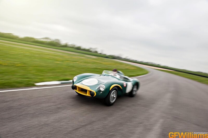Green racing car on track