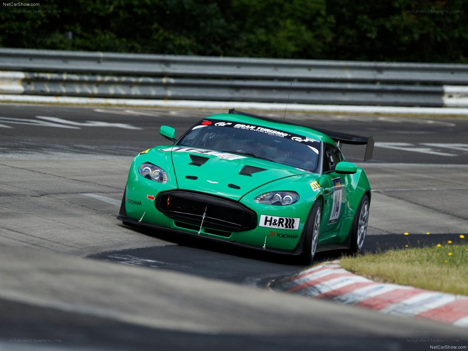 Green racing car on track