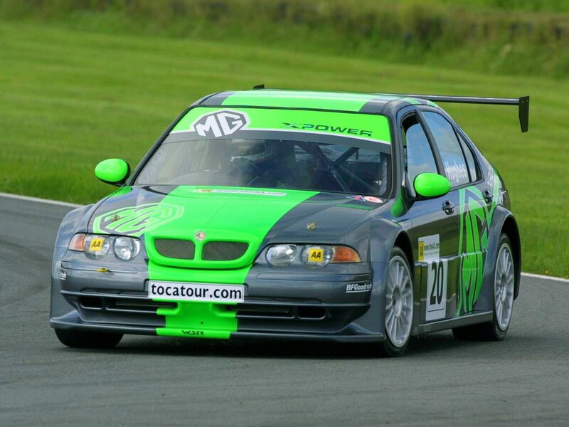 green racing car on track