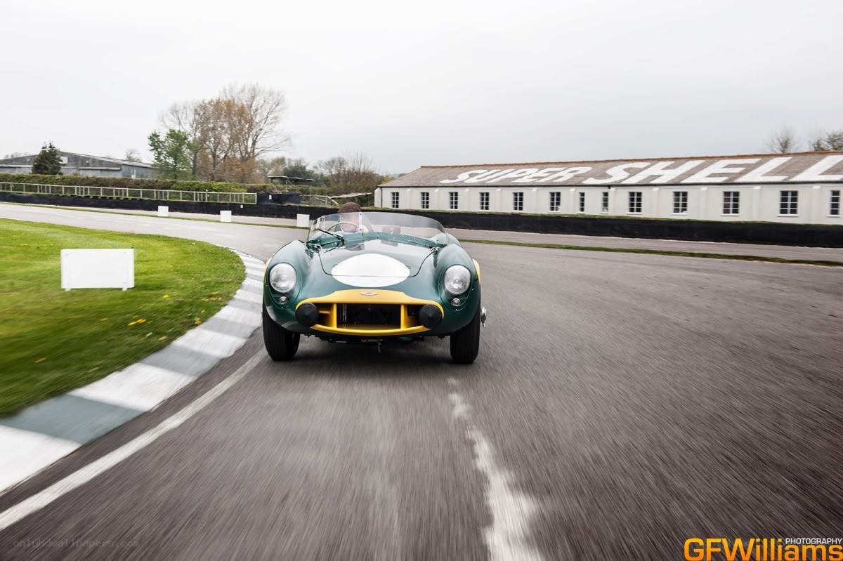 Green racing car on track