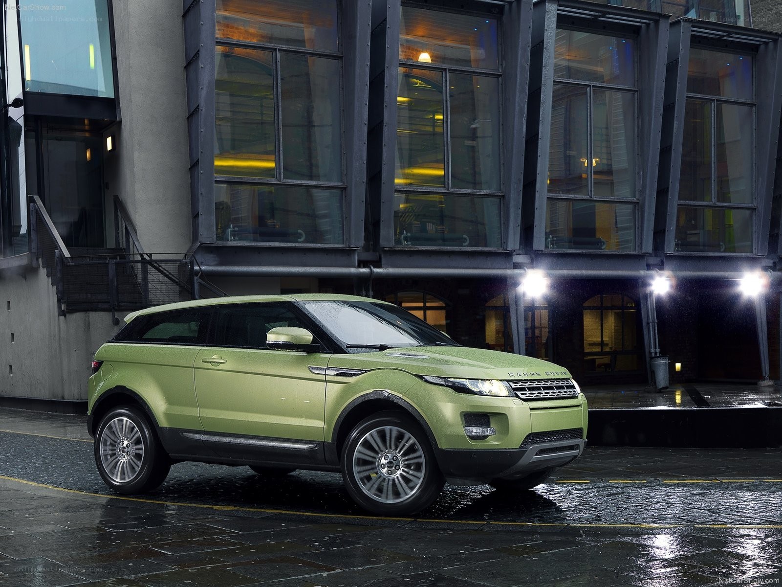 Green Range Rover in city