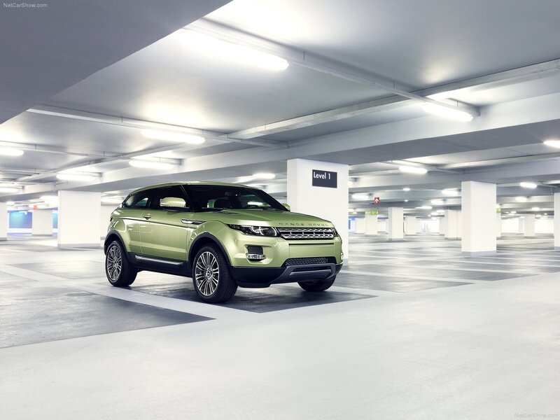 Green Range Rover in parking garage
