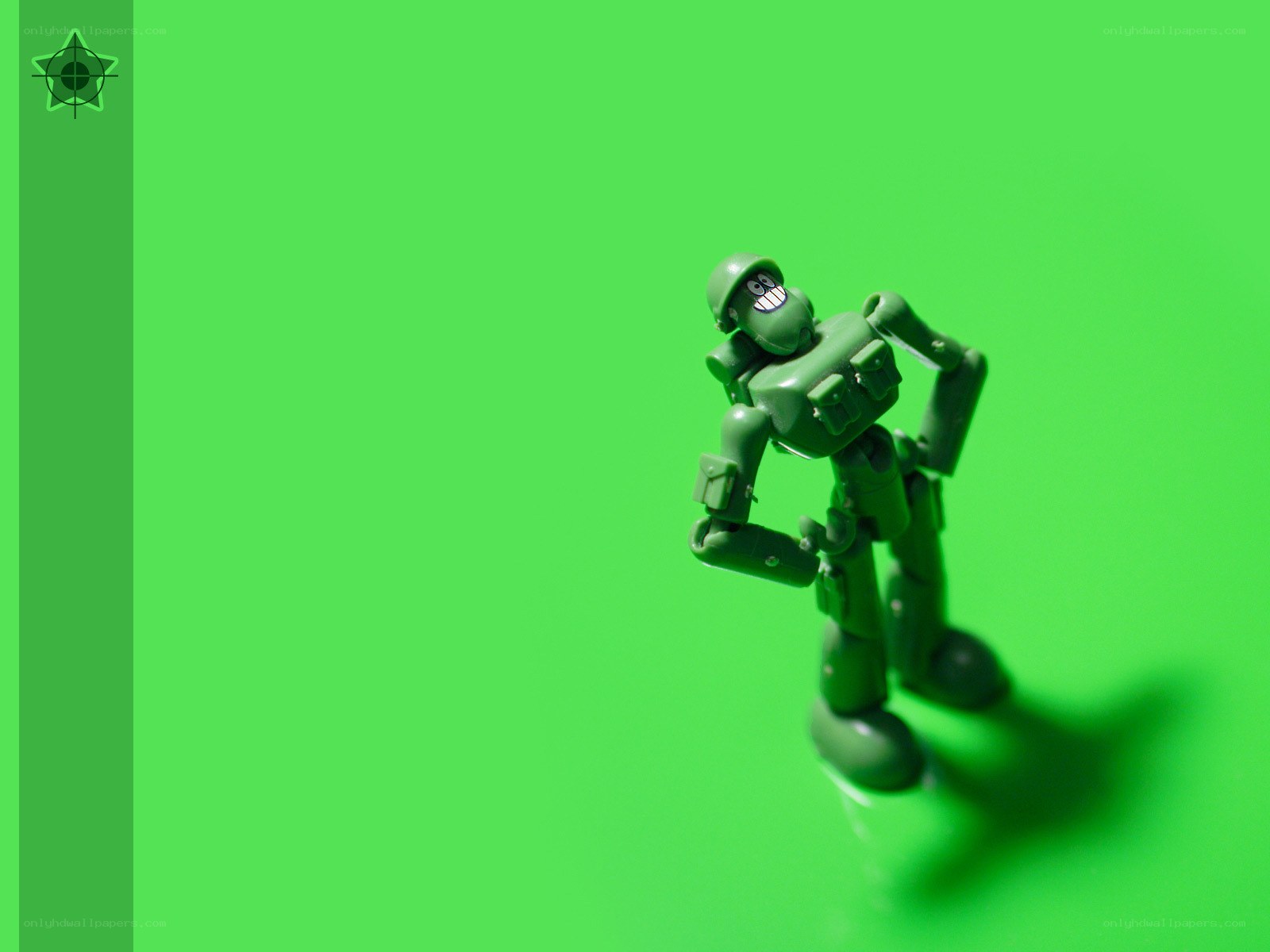 green robot toy on green background