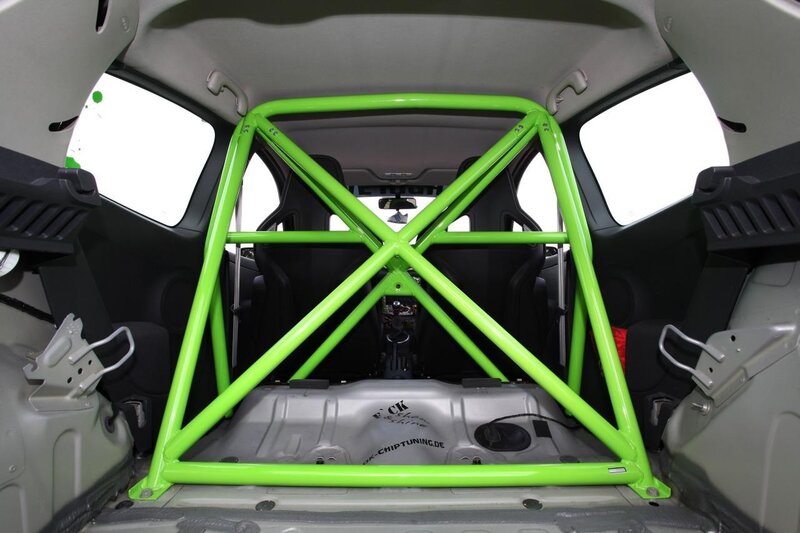 Green roll cage in car interior