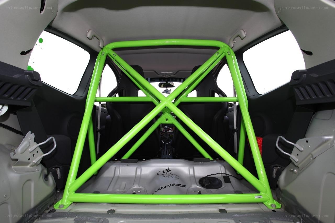 Green roll cage in car interior