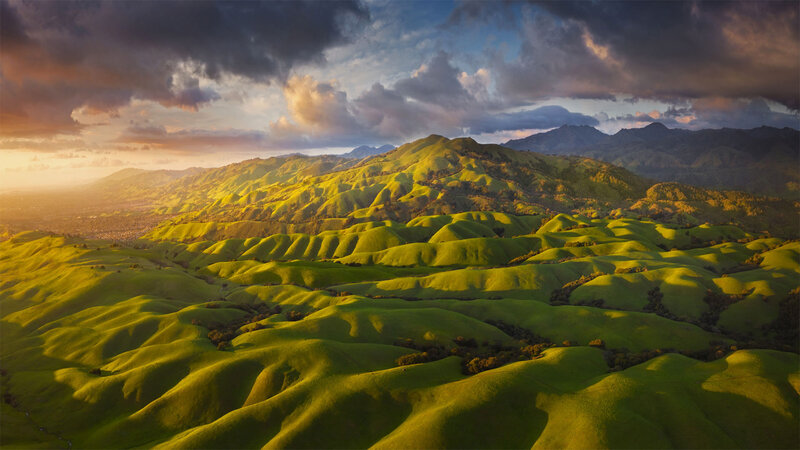 Green Rolling Hills — Dramatic, Sunset