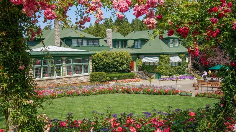 Green-roofed House with Flowers — Green