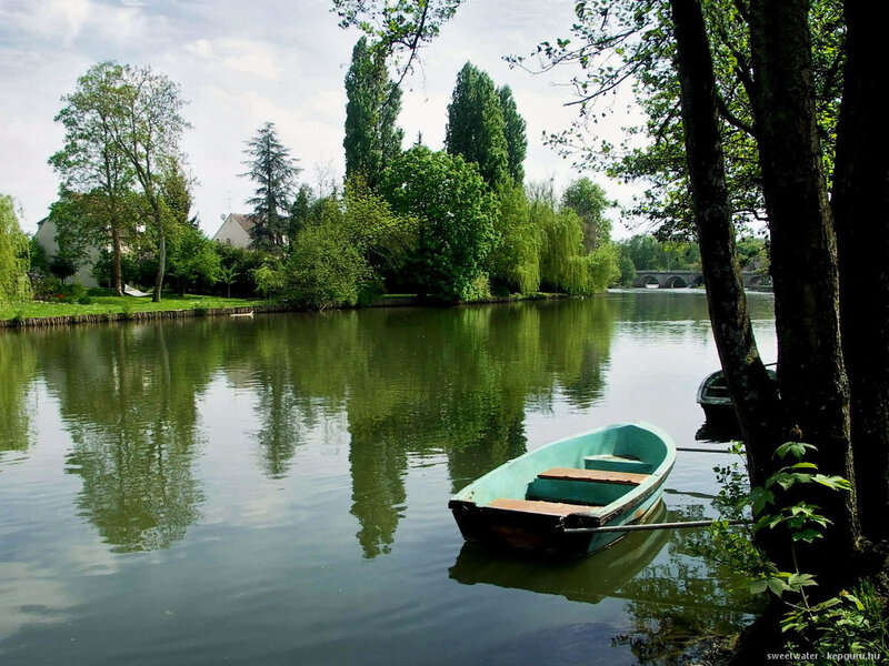 Green Rowboat on River