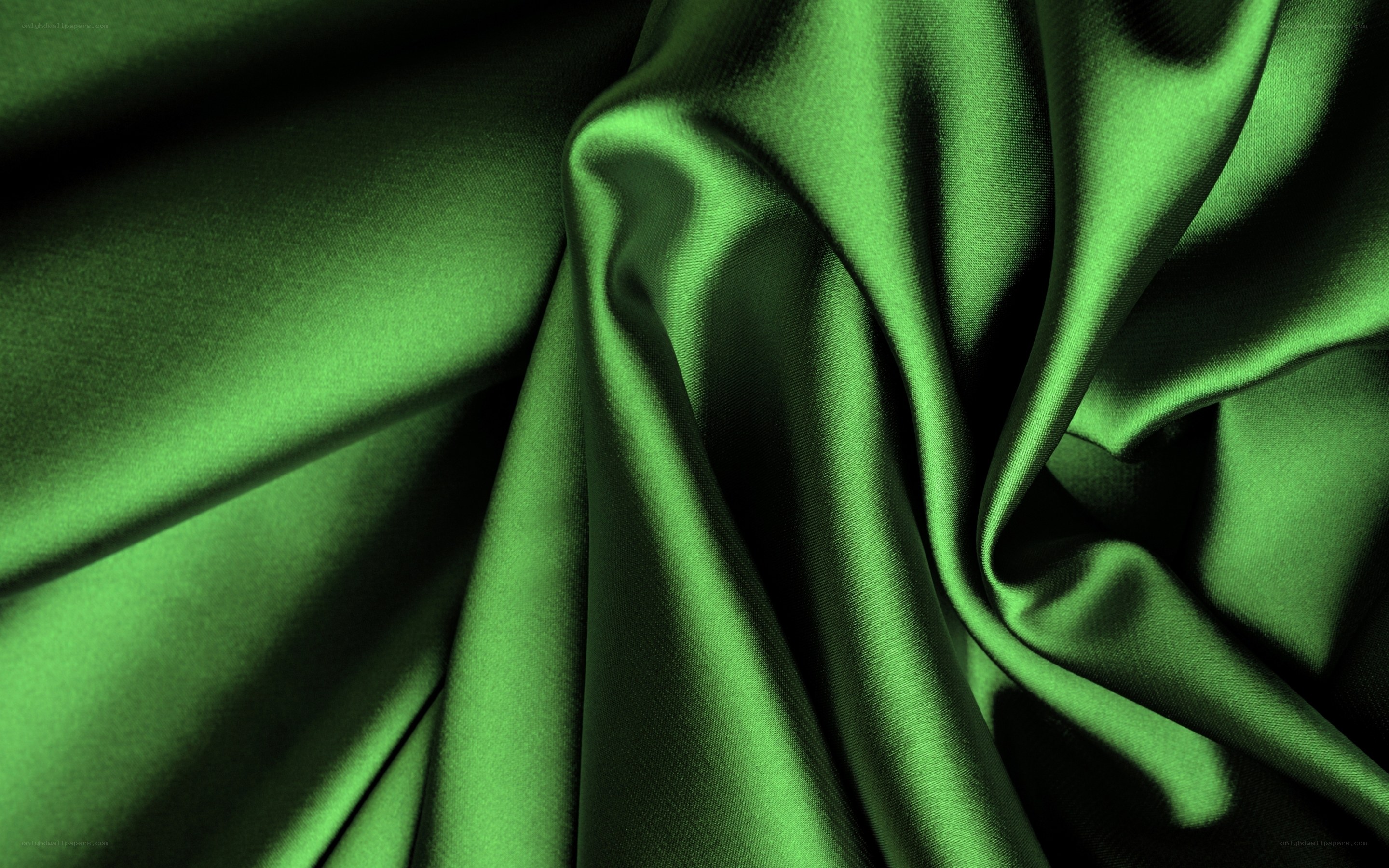green satin fabric texture