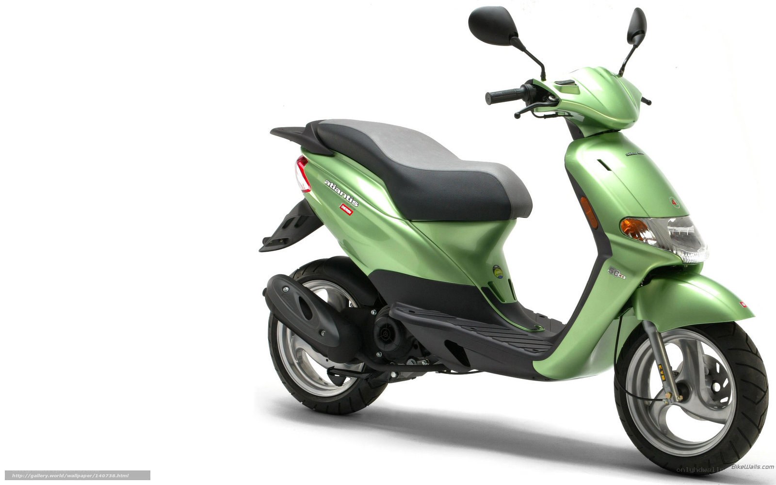 green scooter on white background