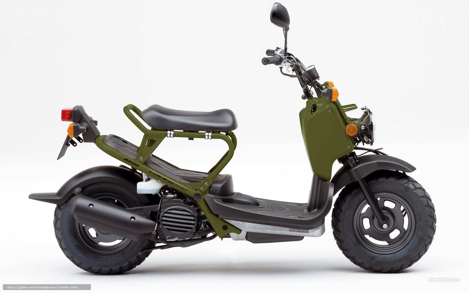 green scooter side profile