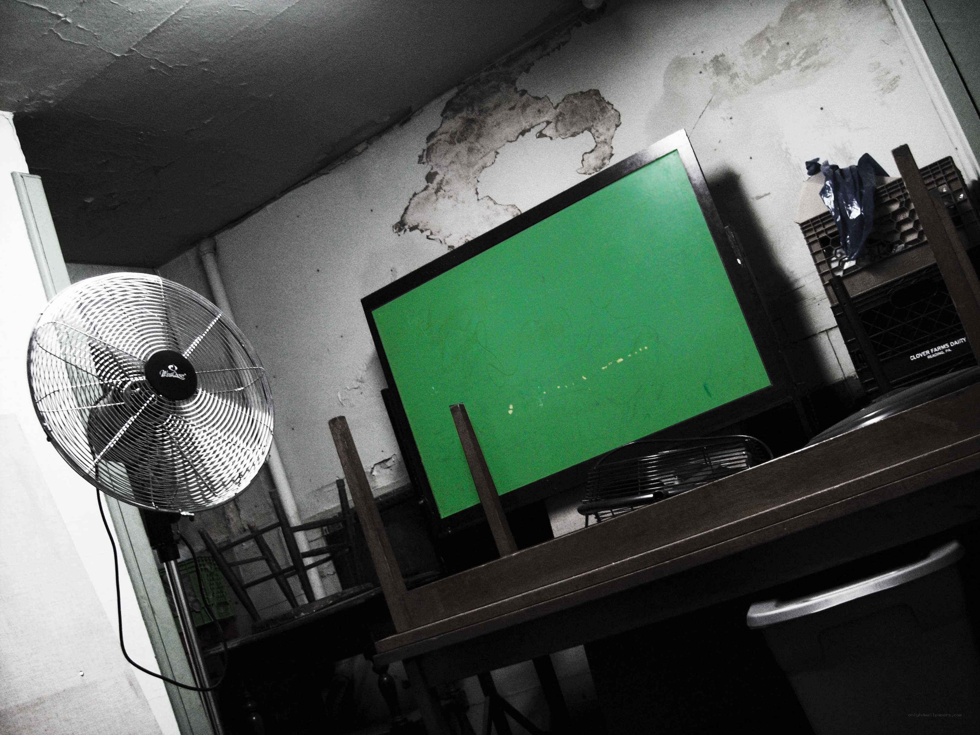 green screen in a cluttered room