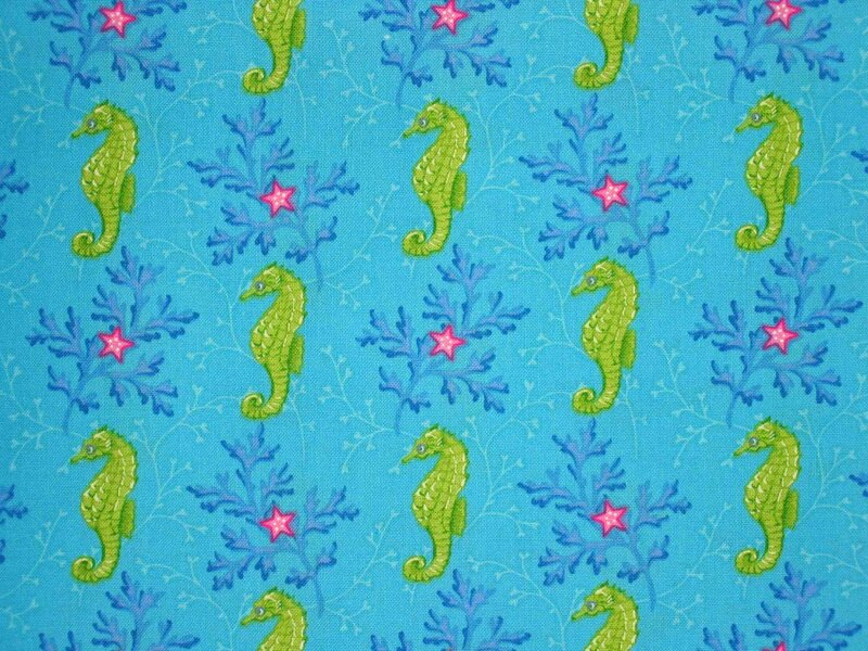 Green Seahorses on Blue