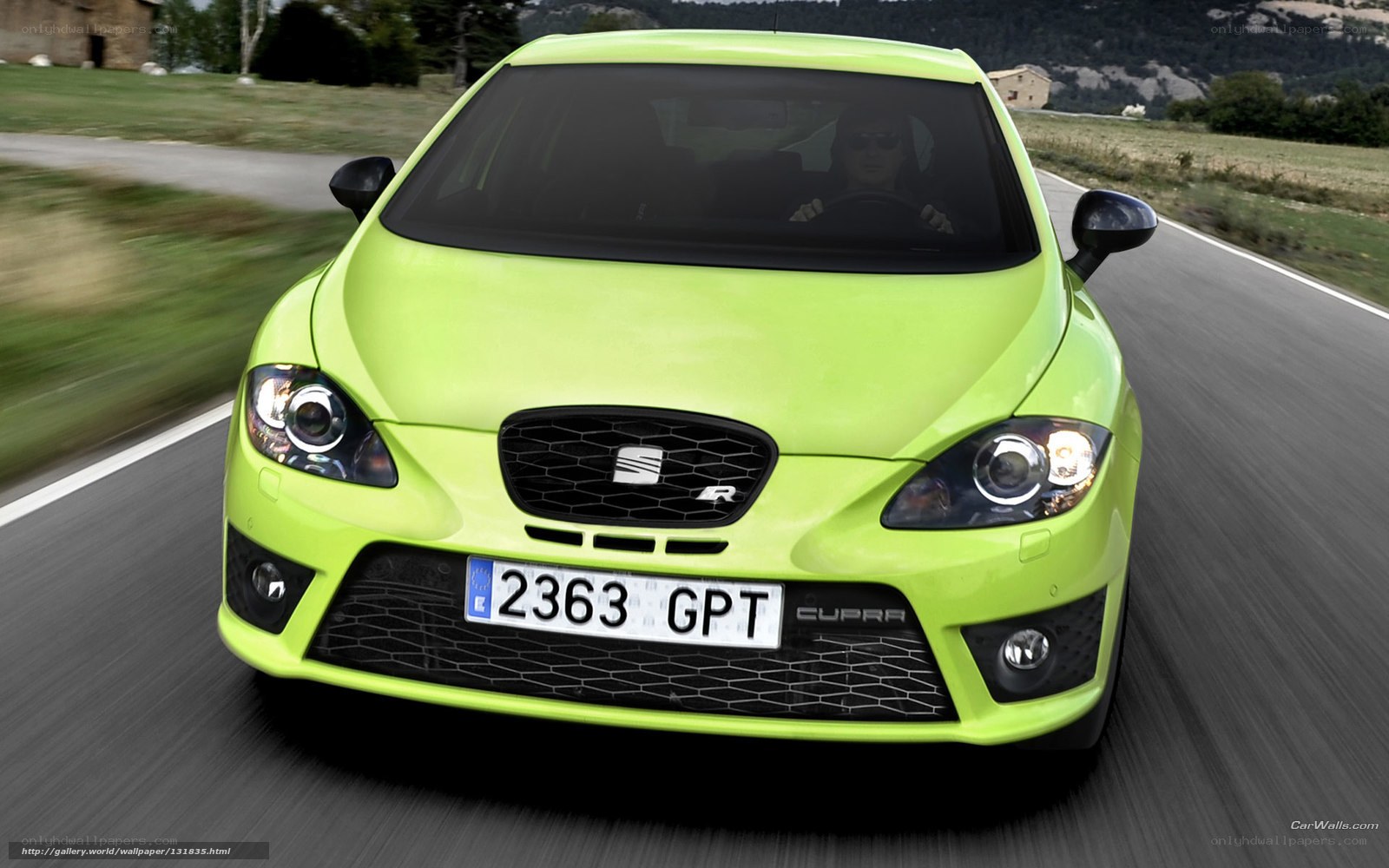 green seat cupra in motion