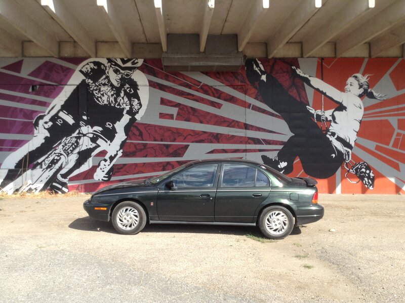 Green Sedan Car — Black