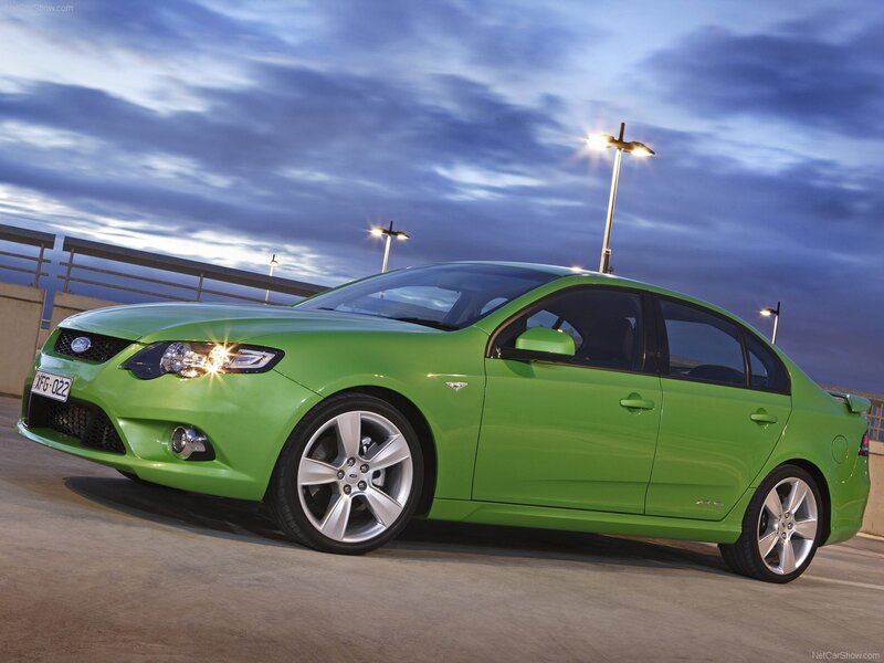 Green Sedan Car — Dramatic, Sunset