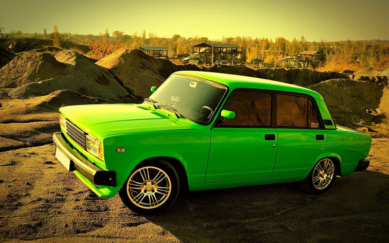 Green Sedan Car — Dramatic