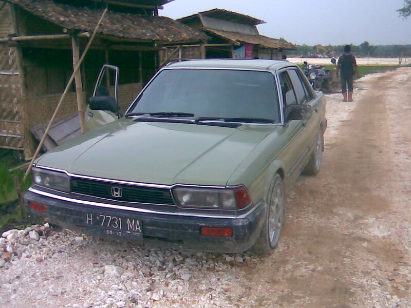 Green Sedan Car — Rural