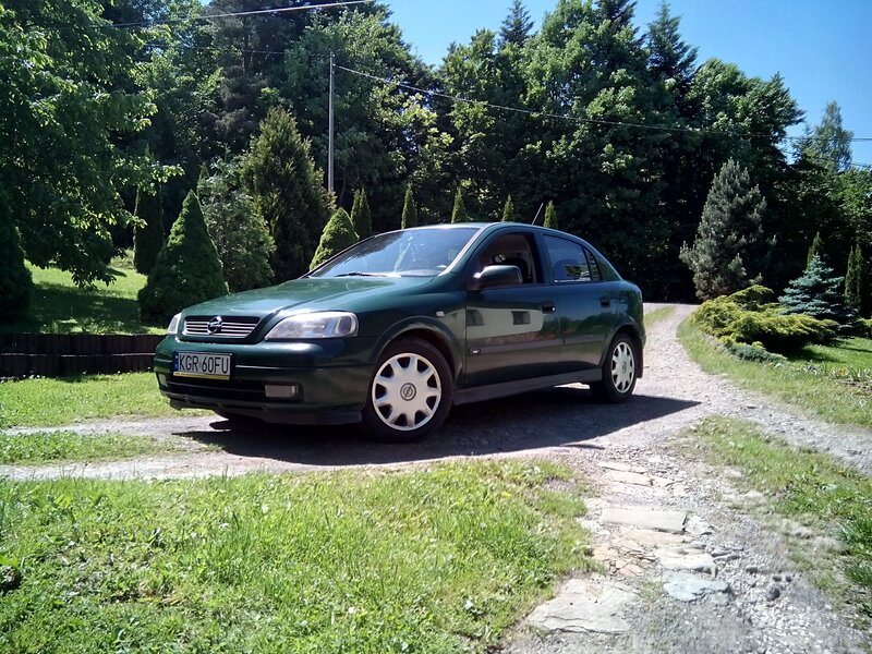 Green Sedan Car — Serene