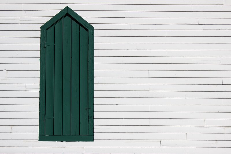 Green Shutter on White Wall