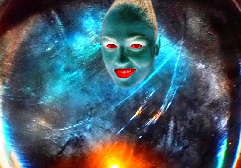 Green-skinned Face with Red Eyes