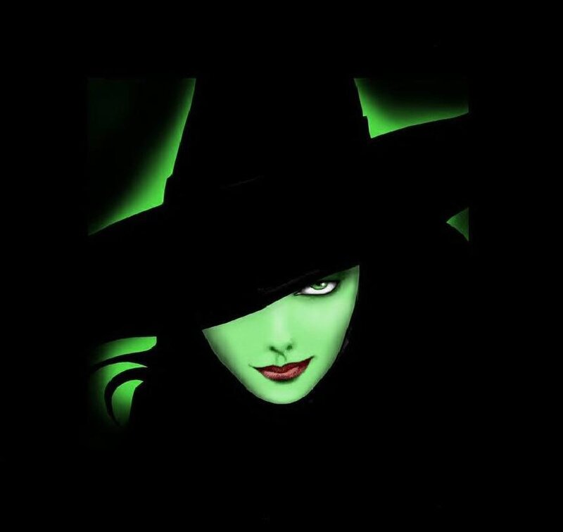 Green-skinned Woman in Hat