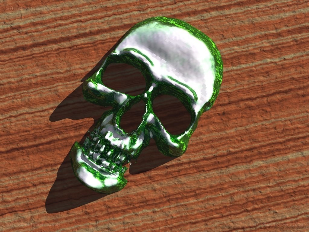 green skull on wood