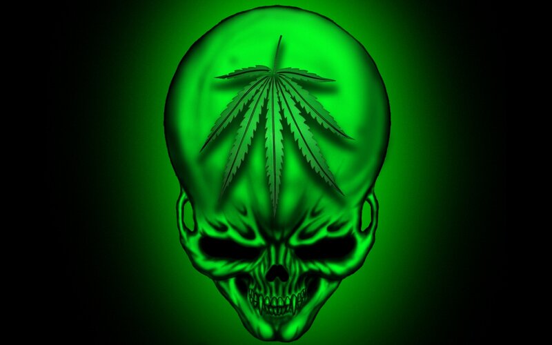green skull with cannabis leaf