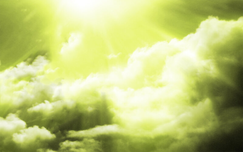 green sky with clouds