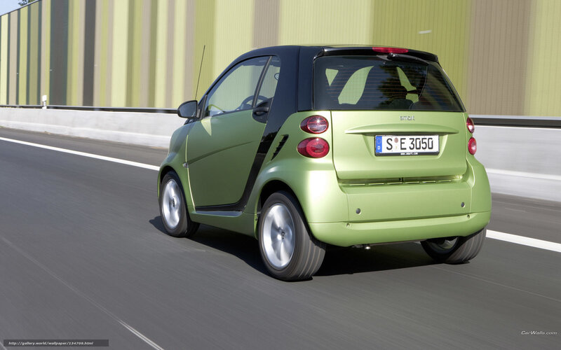 green smart car on road