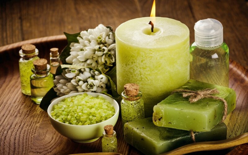 Green Spa Products on Wood — Calm, Photograph, Candle