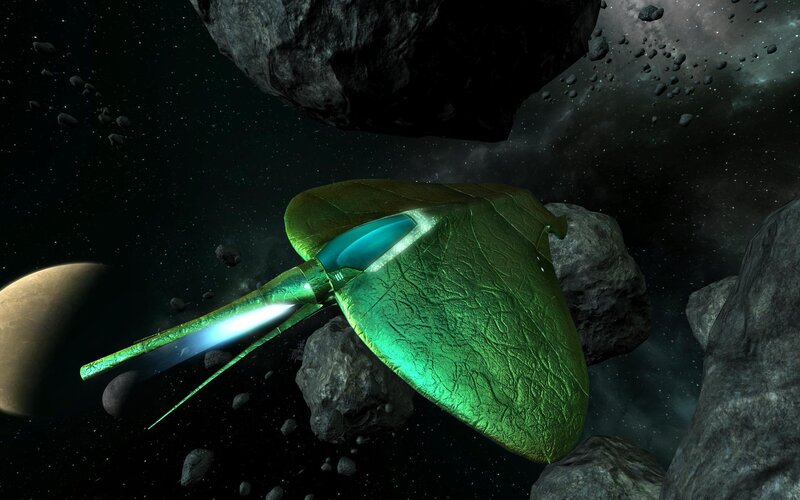 green spaceship in asteroid field