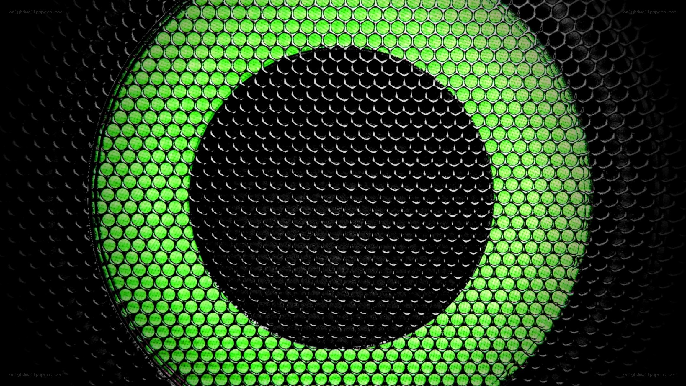 green speaker grille close-up