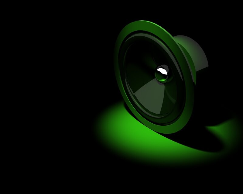 green speaker on black background