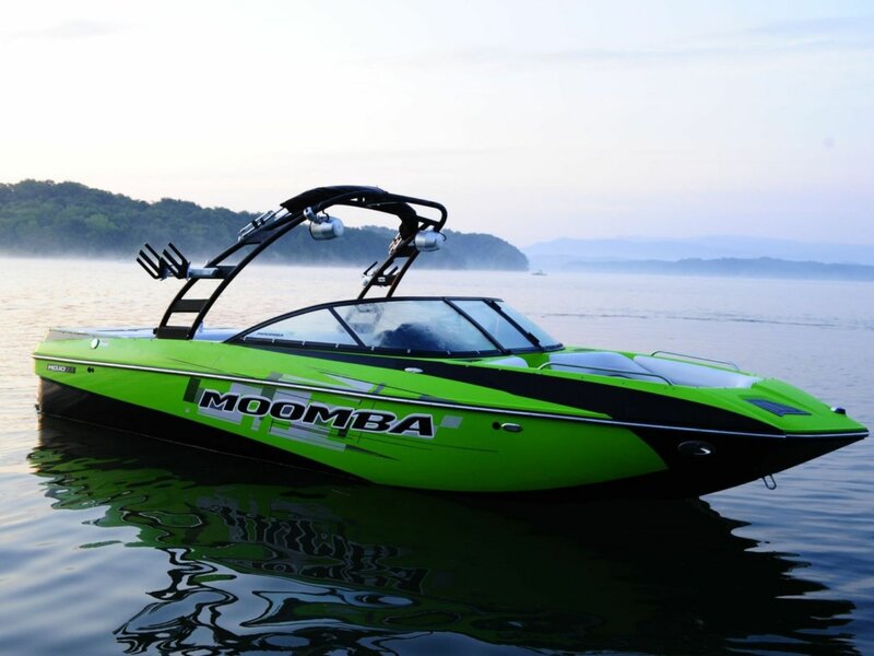 Green Speedboat on Water — Serene
