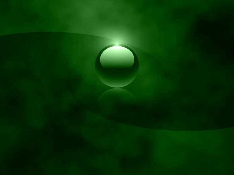 green sphere in dark background