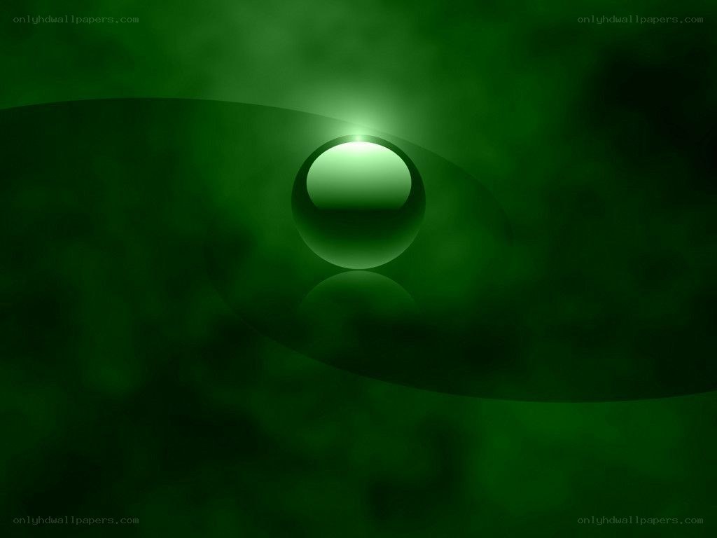 green sphere in dark background
