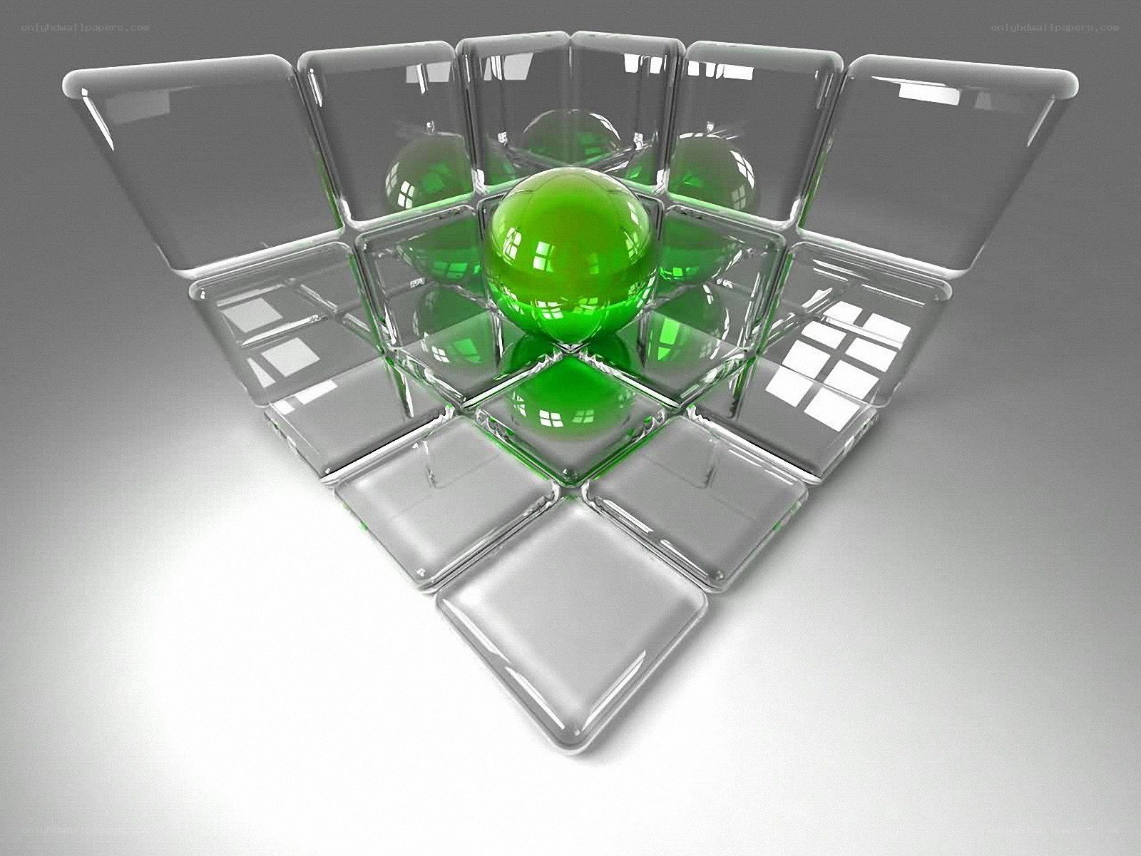 green sphere in glass cubes